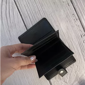 كيف کارتی دکمه دار چرم طبیعی