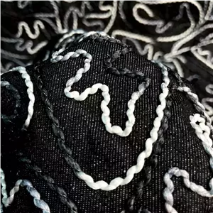 پارچه جین کوک دوزی سفید مشکی وارداتی