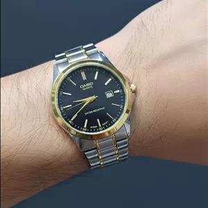 ساعت مچی مردانه کاسیو استیل با فریم طلایی و صفحه مشکی