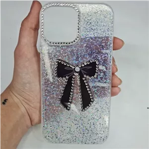 گارد Iphone 13 pro max طرح شفاف نگین دار و شاین دار پاپیونی دور نگین آیفون 13 پرومکس قاب و کاور