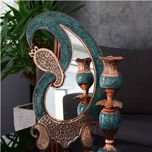 اینه آینه بته جغه فیروزه کوبی نیشابور مسی 30 سانتی قلم زنی شده و لب شبکه ای و ملیله کاری شده مبلمونسرا مدل 207329