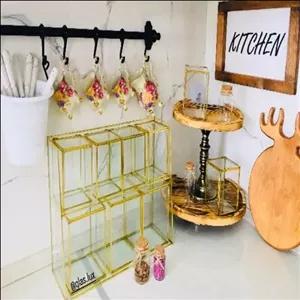 استند پاسماوری هشت تکه رنگ طلایی و شیشه و برنج مبلمونسرا مدل 288833