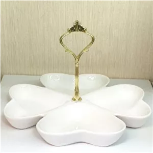 اردو خوری سرامیکی 4 خانه بشقابی شکل قلب دسته دار وارداتی دارای 4 خانه شکل قلب برای انواع آجیل و تنقلات و شکلات و ..... مبلمونسرا مدل 265655 