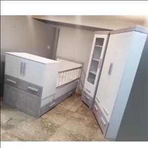 سرویس چوب نوزاد نوجوان مدل مدرن شامل کمد جالباسی ویترین تخت دومنظوره نوزاد نوجوان با2سال گارانتی مبلمونسرا مدل 230857