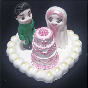 مجسمه تندیس سنگی عروس و دامادارتفاع10و طول12سانتی طرح2 ازدواج عروسی گیفت کادو هدیه دکور مبلمونسرا مدل 252458