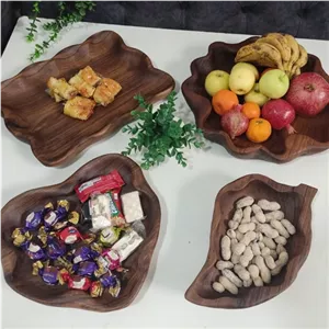 اردوخوری چوبی،ست چوبی ،ظروف چوبی،ظرف چوبی،میوه خوری چوبی ،میوه خوری دفرمه ووب گردو،اجیل خوری چوبی،شکلات خوری چوبی،ظرف مبلمونسرا مدل 265583 