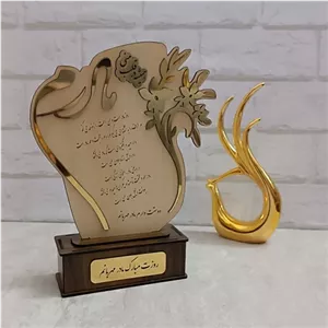 تندیس روز معلم و روز مادر تندیس جنس ام دی اف ارتفاع تندیس حدودا 25 سانتی متر روکش مولتی استایل طلایی مبلمونسرا مدل 252282