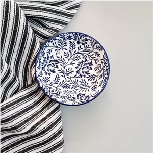 کاسه مزه سرامیکی قطر 10 سانت شکوفه آبی برند مبلمونسرا مدل 292375