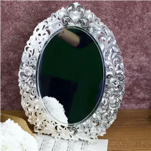 آینه پرکار مشبک بیضی طرح نقره 38سانتی مناسب برای هفت سین کار دست تولیدی کارگاه شمیسا مبلمونسرا مدل 261671