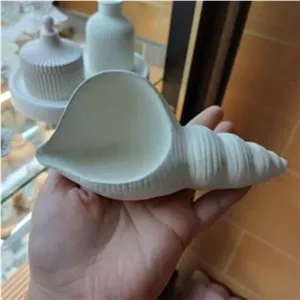مجسمه دکوری صدف گچی سفره هفت سین جالوازم آرایشی مبلمونسرا مدل 251329