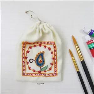 کیسه تزئینی پته دوزی،کیسه هدیه پارچه ای،صنایع دستی،هدیه سنتی دست دوز،هدیه مهمان خارجی،کیسه نظم دهنده،کیسه آجیل و جهیزیه مبلمونسرا مدل 299145 