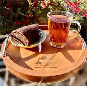 سینی چوبی گرد دسته دار رنگ طبیعی از جنس چوب راش گرجستانی مبلمونسرا مدل 275553