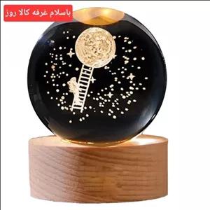 چراغ خواب رومیزی مدل گوی کریستال طرح ماه و فضانورد قطر 8سانتی متر مبلمونسرا مدل 231869
