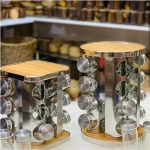 جاادویه ای چرخشی 12 تایی استیل چوبی جا ادویه ای چرخشی استیل چوبی 12تایی جا ادویه ای گردان 12 تایی استیل چوبی پاسماوری مبلمونسرا مدل 292548