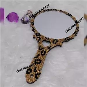 آینه با روکش نگین طرح پلنگی/جنس اطراف آینه چوبی می باشد مبلمونسرا مدل 262062