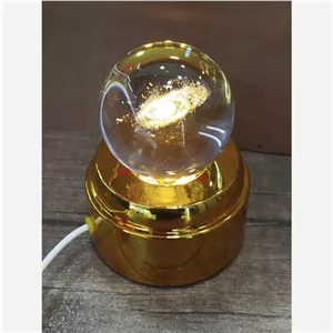 گوی کریستالی پایه گردان طرح کهکشان موزیکال مبلمونسرا مدل 232571