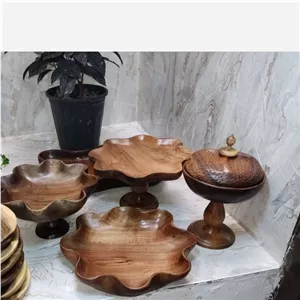 ارسال رایگان.ست چوبی پذیرایی.میوه خوری و شیرینی خوری و شکلات خوری و اجیل خوری ، سینی چوب گردو.ظروف دست تراش چوب گردو مبلمونسرا مدل 265216