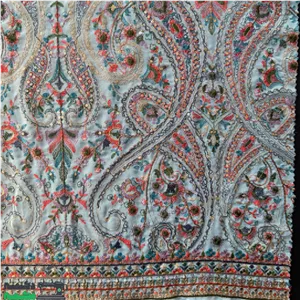 پارچه حریر زمینه آبی روشن و گلدوزی