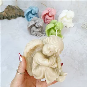 شمع تزئینی مدل فرشته نشسته ژورنالی