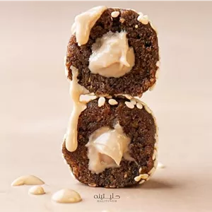 ترافل خرمایی (توپک) کنجدی با مغر ارده حلیتینه (یک کیلیویی)