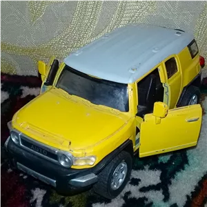 ماکت ماشین فلزی تویوتا FJ کروزر موزیکال