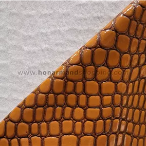 چرم مصنوعی ورنی طرح سنگی رنگ عسلی (ابعاد 100x140 سانت) 