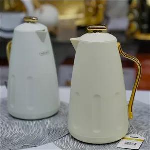 فلاسک دسته طلایی اورجینال شیشه صورتی