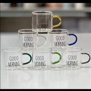 فنجان مدل شات قهوه پیرکس دسته رنگی طرح GOOD MORNING