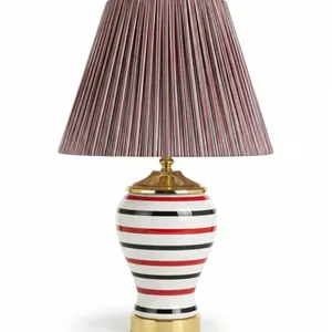 آباژور رومیزی نواری قرمز مشکی با پایه طلایی