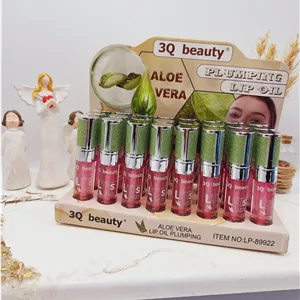 برق لب شاینی صورتی با تقویت کننده لب حاوی روغن لب آلوئه ورا بسیار خوش رنگ برند 3Q beauty کد 899222 