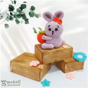 عروسک بافتنی دستبافت طرح خرگوش تپل 12 سانتیمتری رنگ یاسی خانمان مدل 369914