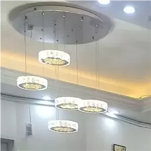لوستر آویز کریستالی کد 142 دایره سایز 20 سانت تعداد حلقه 5 استیل نقره ای ریموت دار کرایه به عهده مشتری خانمان مدل 349634