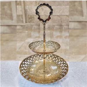شیرینی خوری برنجی هندی مدل دو طبقه طرح مشبک با سطح کیفیتی درجه یک بسیار زیبا و مناسب استفاده دائم و قابل شستشو با ضمانت خانمان مدل 344608 