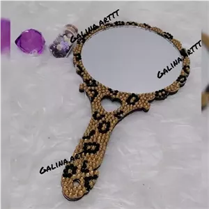 آینه با روکش نگین طرح پلنگی/جنس اطراف آینه چوبی می باشد خانمان مدل 336826