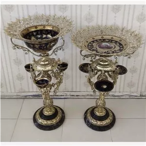 میوه خوری پایه دار کنار سالنی برنز فرشته چند ظرفه برنزی خانمان مدل 339299 