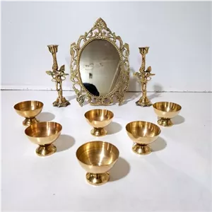 هفت سین برنجی ست 9 تکه با آینه و 2 عدد شمعدان و 6 عدد پیاله نیم پایه مناسب استفاده دائم و قابل شستشو بدون تغییر رنگ خانمان مدل 344615