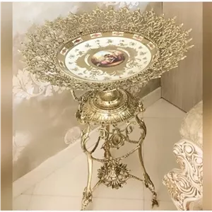 میوه خوری کنار سالنی آجیل خوری پایه دار برنز پایه کالسکه فرشته ملکه برنزی بشقاب طلاکوب اعلا جا میوه برنجی خانمان مدل 344935 