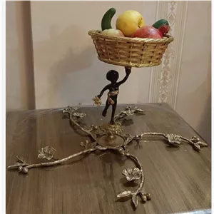 سبد میوه خوری برنز برنجی مجسمه دار فرشته سبد حصیری برنز بافت برنزی خانمان مدل 350317 