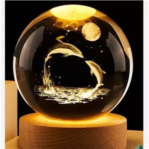 چراغ خواب مدل گوی کریستالی طرح دلفین قطر 6 و8 خانمان مدل 324511