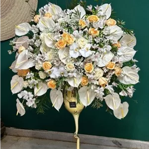 تحویل جام گل در نمایشگاه قهوه تهران 1404 از نزدیک ترین گل فروشی 5565