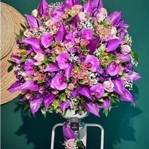 تحویل جام گل در نمایشگاه قطعات خودرو تهران 1404 از نزدیک ترین گل فروشی 5598