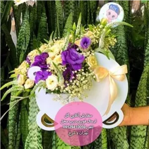 دسته گل و کیک تولد برای تولد لاکچری بچه گانه