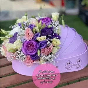 دسته گل و کیک تولد برای هدیه به خانواده نوزاد