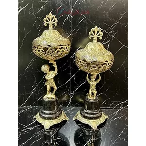 شکلات خوری برنزی در دار، طرح پسر بچه پایه سنگ شکیل و طلایی 