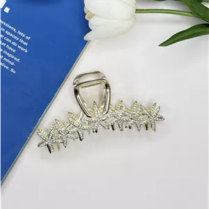 کلیپس فلزی طرح ستاره دریایی پیوسته خطی فول نگین براق طلایی روشن با کیفیت  عالی وارداتی11cm