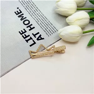 گیره مو‌ انبری طرح تاج طلایی تراش دار 6.5cm
