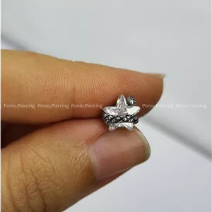 پیرسینگ گوش ستاره مارپیچ