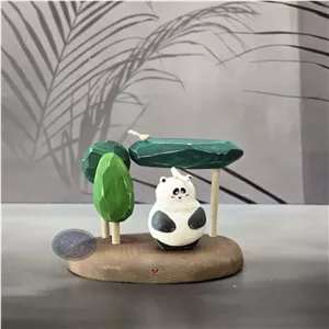 مجسمه چوبی پاندا در جنگل کاظمی