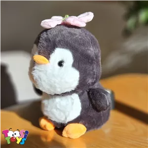 عروسک پنگوئن گل به سر