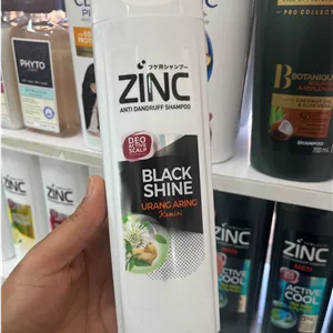 شامپو ضد شوره و درخشان‌کننده زینک Zinc مدل Black Shine (حاوی عصاره Urang Aring)